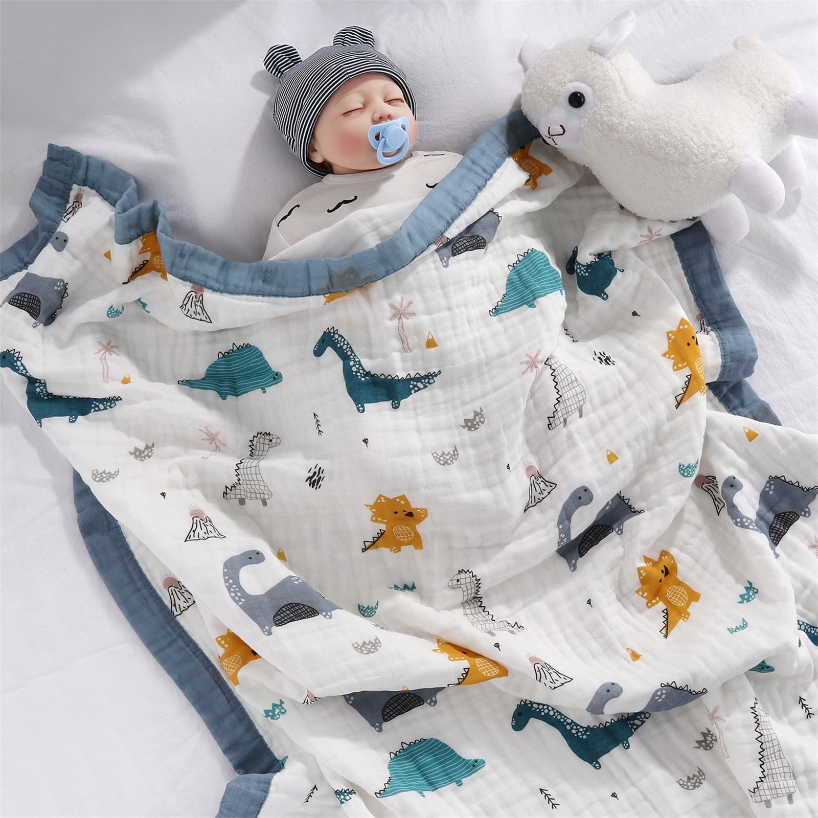 baby is sleeping with sheep in Cotton Baby Blanket